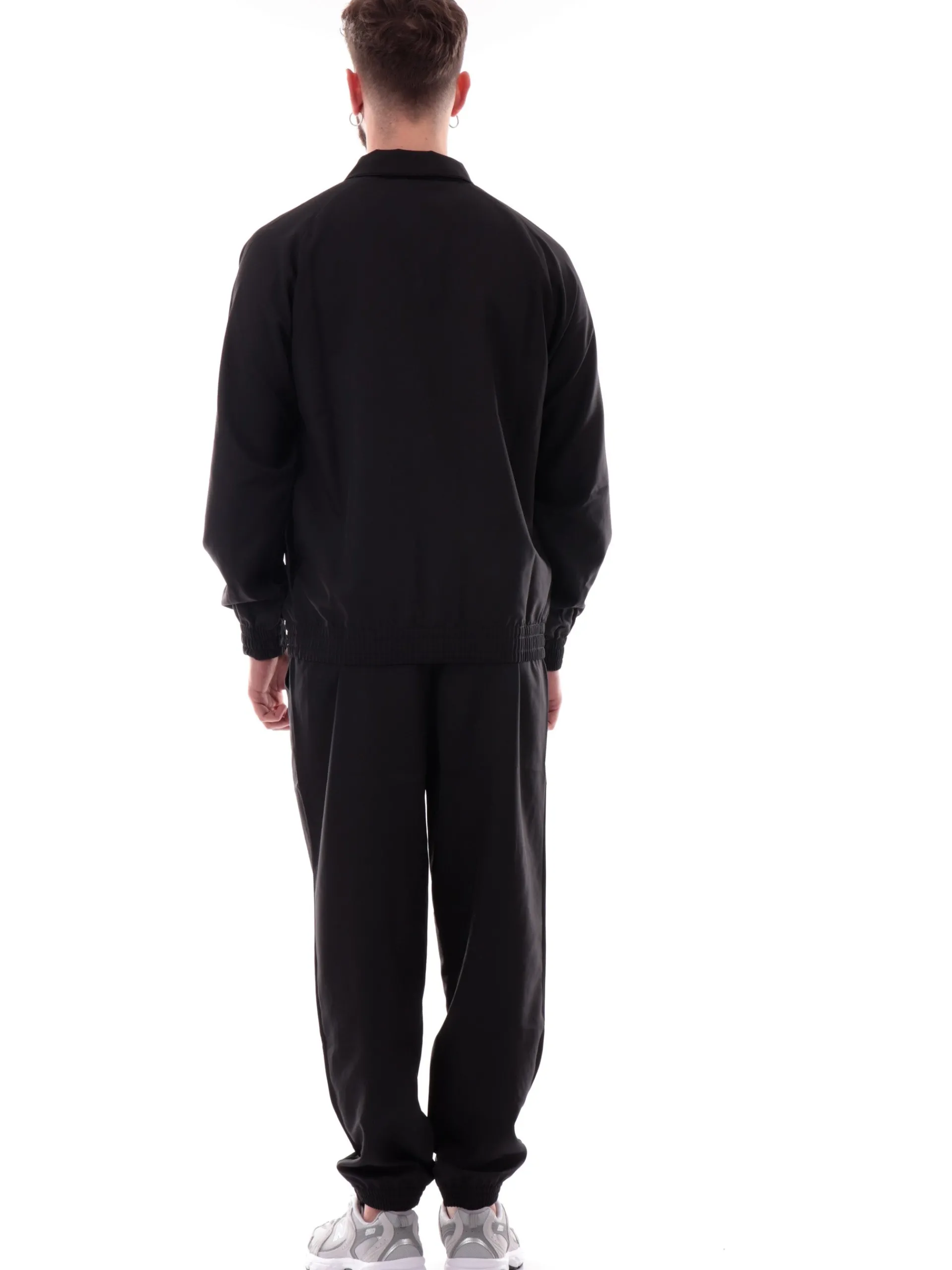 PUMA Tute*Tuta completa nera Woven Piping da uomo 684849